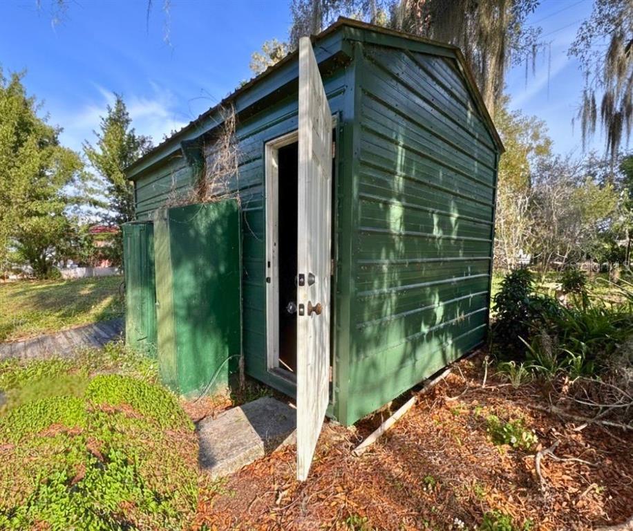 1730 Neptune Road Kissimmee, FL 34744 - Photo 29 of 38 a view of a wooden house with a large window