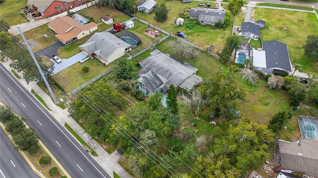 1730 Neptune Road Kissimmee, FL 34744 - Photo 35 of 38 an aerial view of residential houses with outdoor space