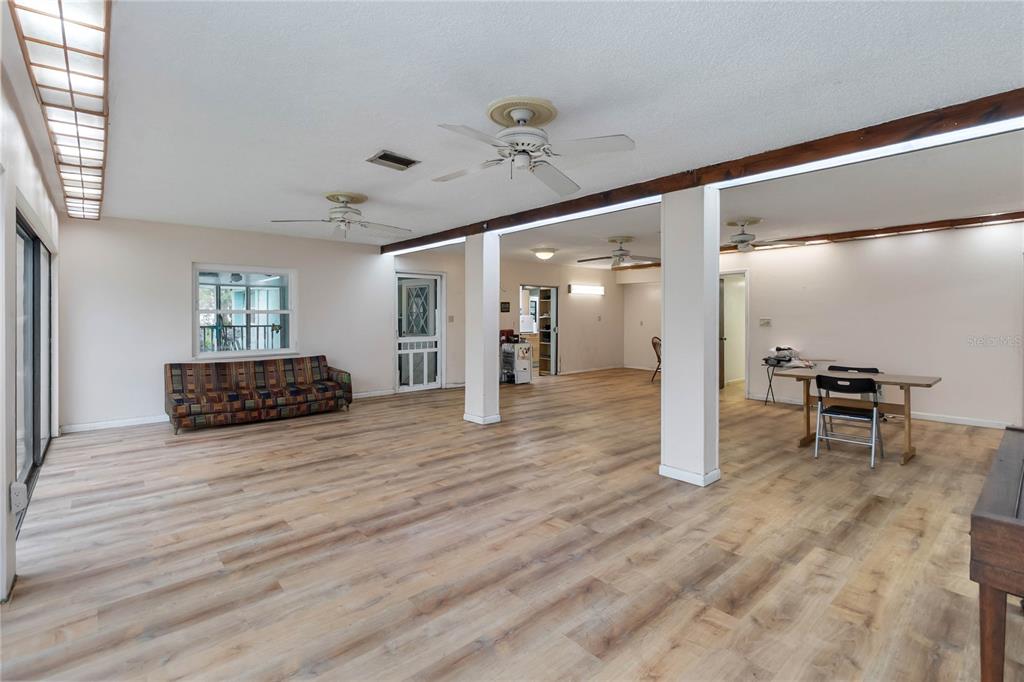 1730 Neptune Road Kissimmee, FL 34744 - Photo 7 of 38 a view of a livingroom with a furniture