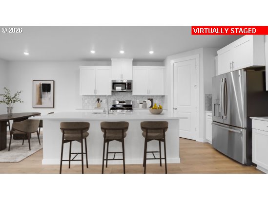 3650 Southwest 37th Street Gresham, OR 97080 - Photo 4 of 8 a kitchen with appliances and cabinets