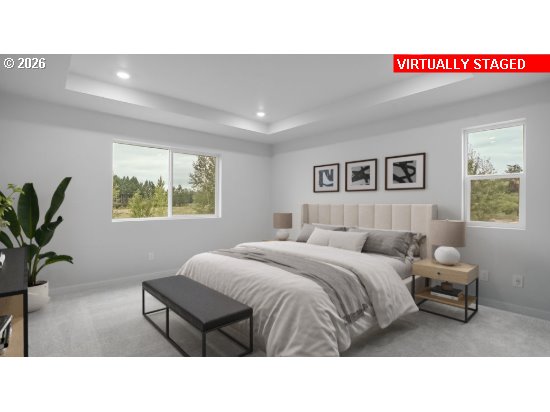 3650 Southwest 37th Street Gresham, OR 97080 - Photo 6 of 8 a living room with a bed and a potted plant