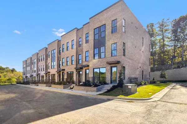 a view of a building with a swimming pool