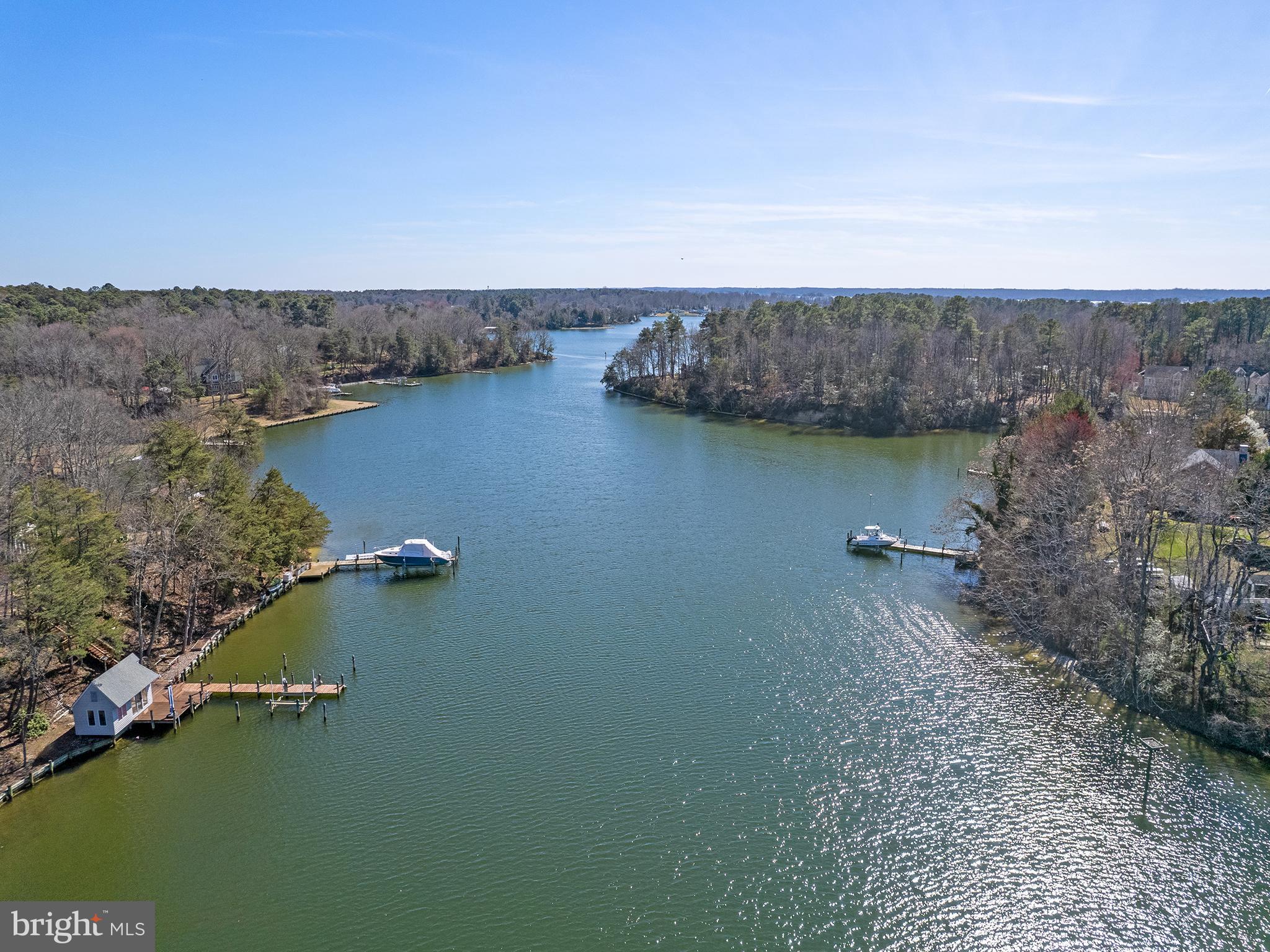 855 Big Road Lusby, MD 20657 - Photo 1 of 48 an aerial view of residential house with outdoor space and lake view
