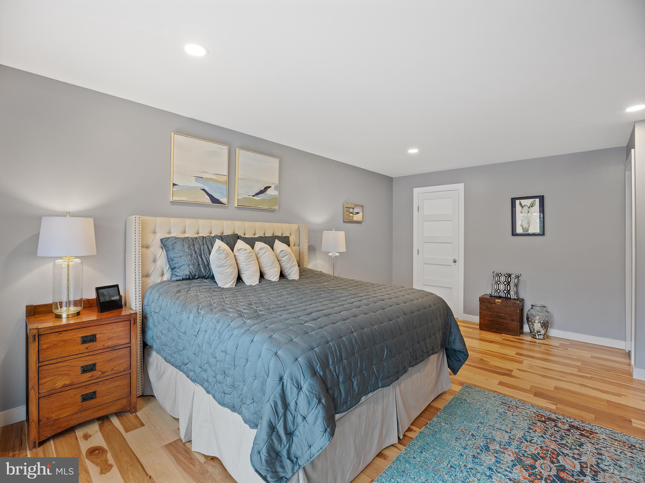 855 Big Road Lusby, MD 20657 - Photo 20 of 48 a bedroom with a bed and a dresser
