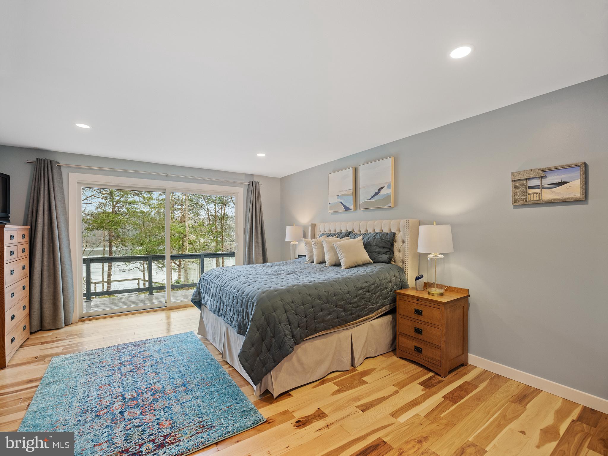 855 Big Road Lusby, MD 20657 - Photo 21 of 48 a bedroom with a bed and a large window