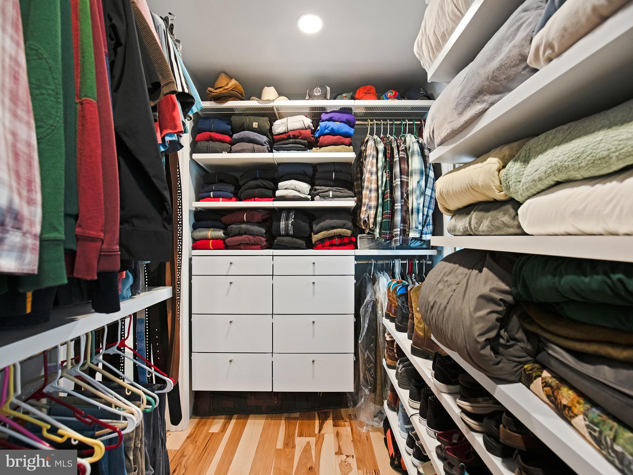 855 Big Road Lusby, MD 20657 - Photo 26 of 48 a view of walk in closet with clothes and shoes