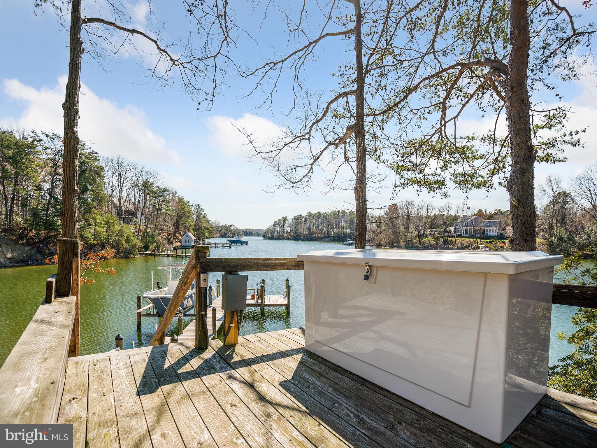 855 Big Road Lusby, MD 20657 - Photo 39 of 48 a view of a balcony with wooden floor and lake view