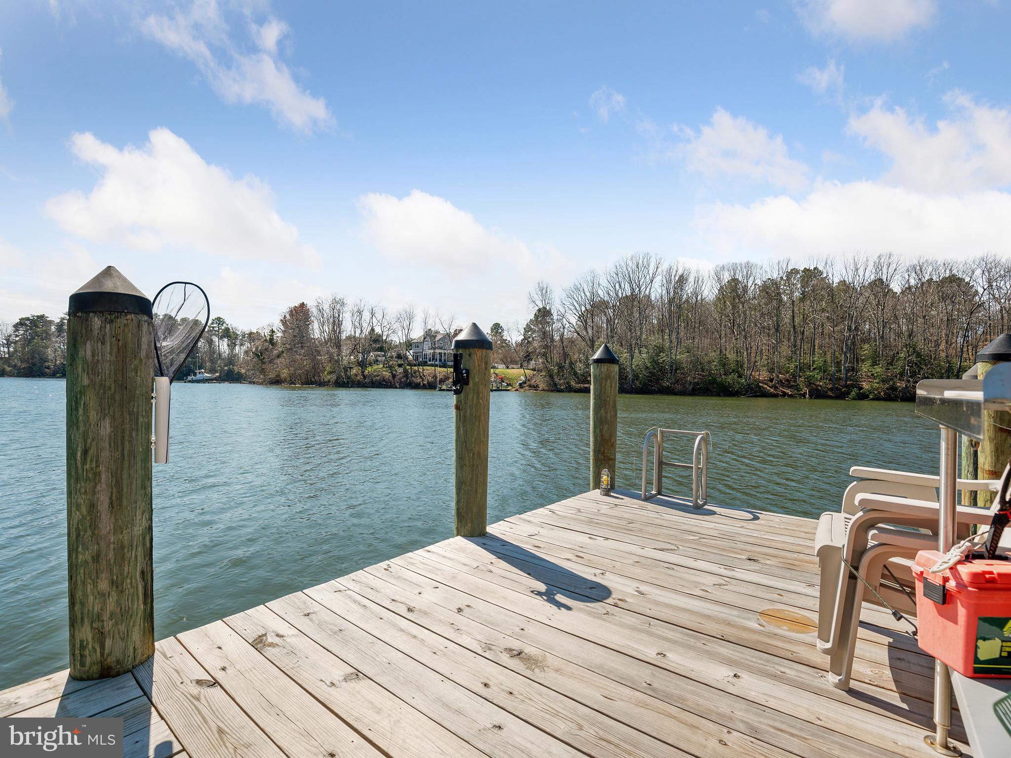 855 Big Road Lusby, MD 20657 - Photo 41 of 48 a view of a lake with a terrace