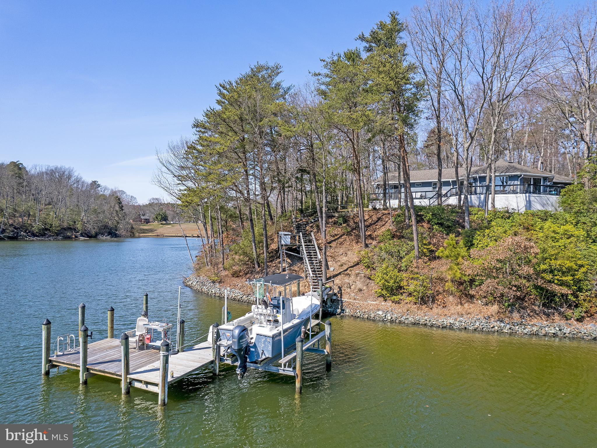 855 Big Road Lusby, MD 20657 - Photo 42 of 48 a view of house with swimming pool and outdoor seating