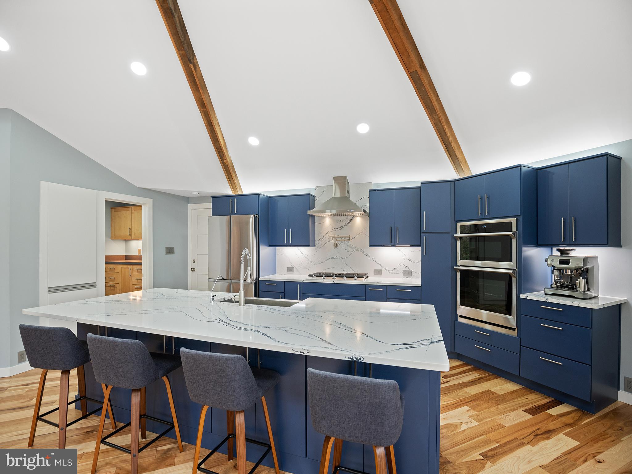 855 Big Road Lusby, MD 20657 - Photo 7 of 48 a kitchen with a table and chairs in it