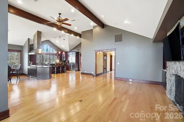a view of livingroom with furniture and flat screen tv