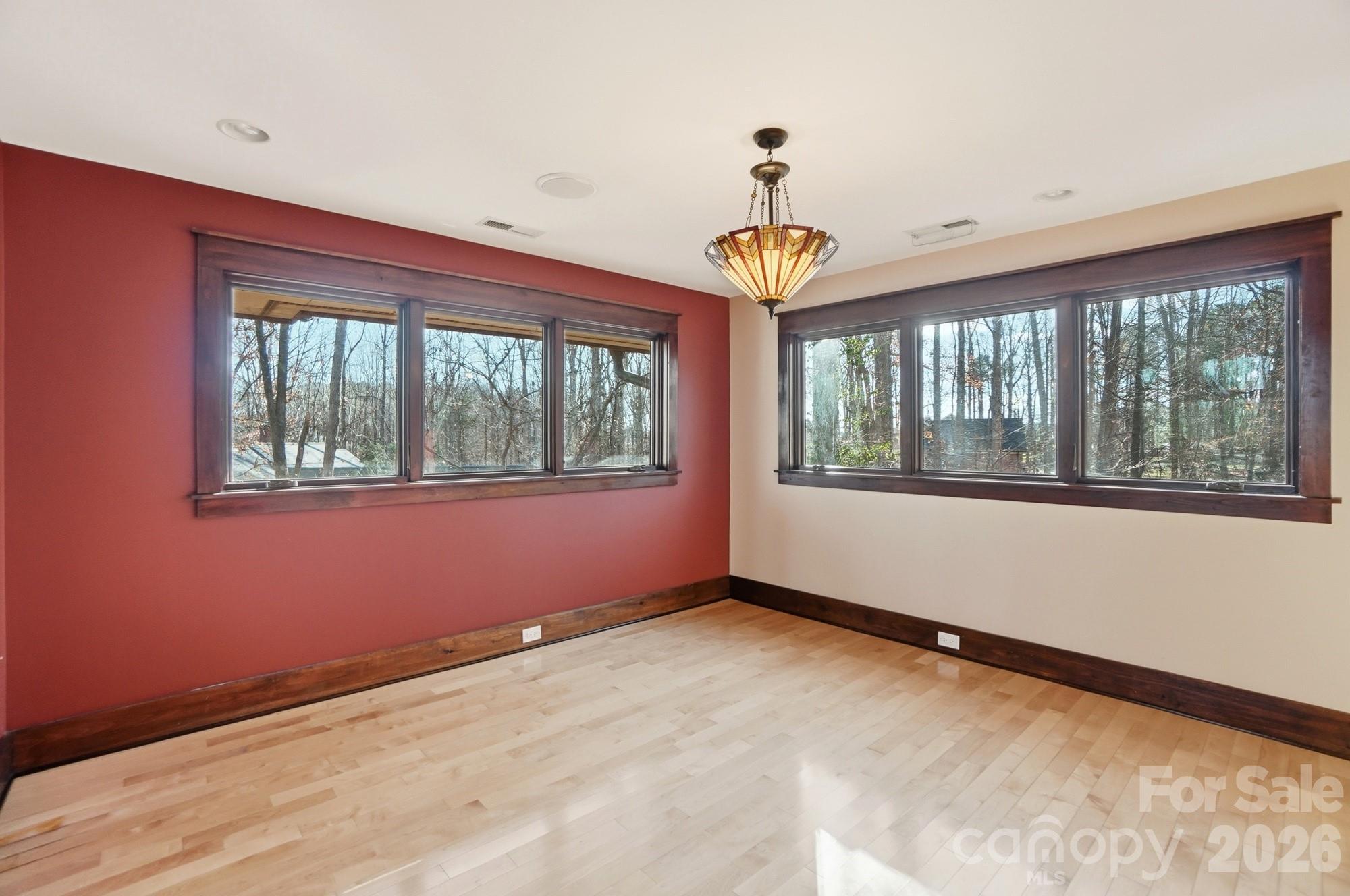 17928 Pages Pond Court Davidson, NC 28036 - Photo 19 of 48 a view of an empty room with a window