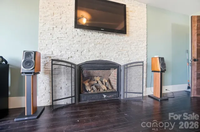 a view of an entryway with wooden floor