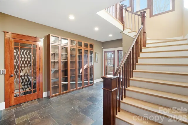 a view of entryway with stairs