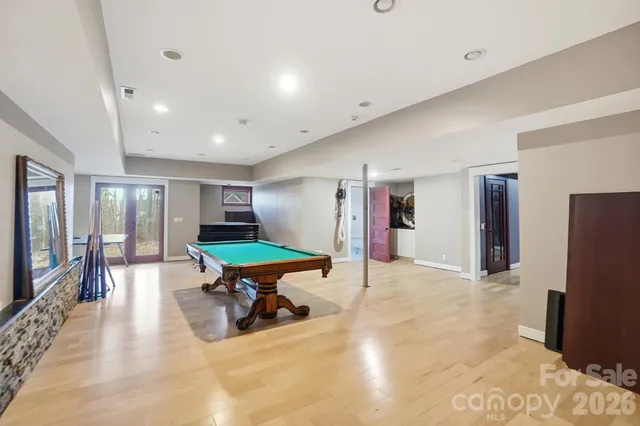 a room with furniture and a flat screen tv