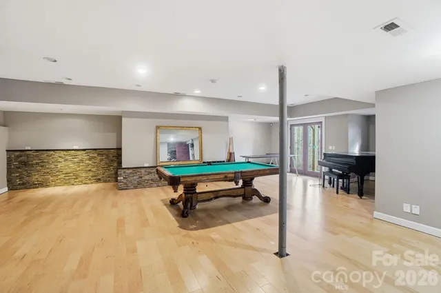 a room with furniture and a wooden floor