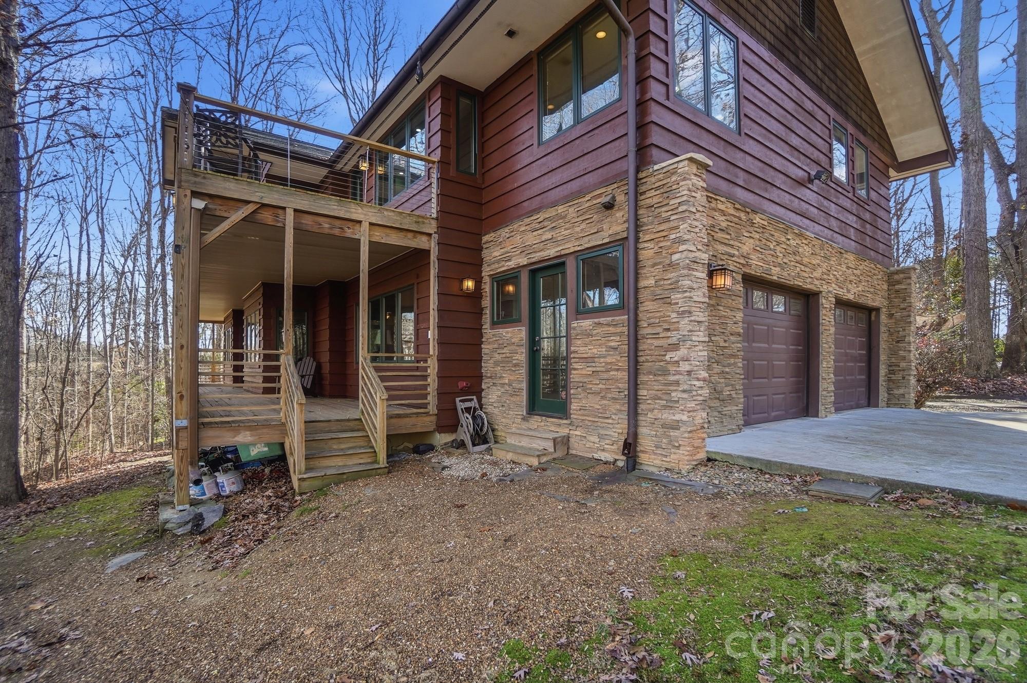 17928 Pages Pond Court Davidson, NC 28036 - Photo 4 of 48 a view of house with backyard and chair