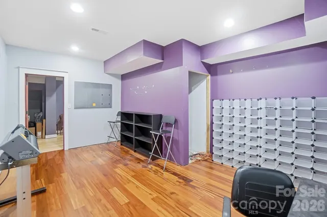 a room with furniture and a flat screen tv