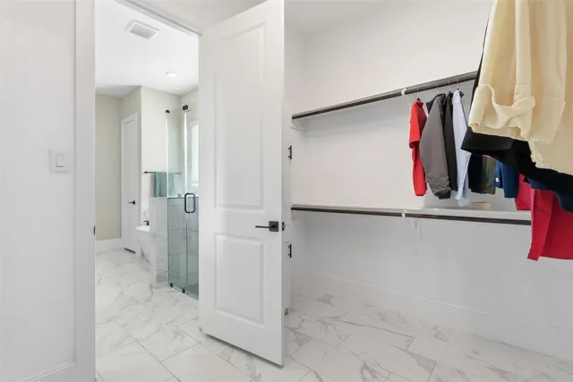 a room with table and chairs