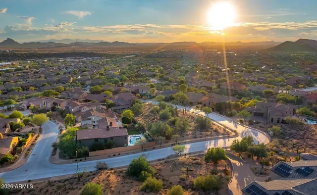 a view of a city with mountains in the background