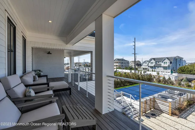 a view of entryway with wooden floor and stairs