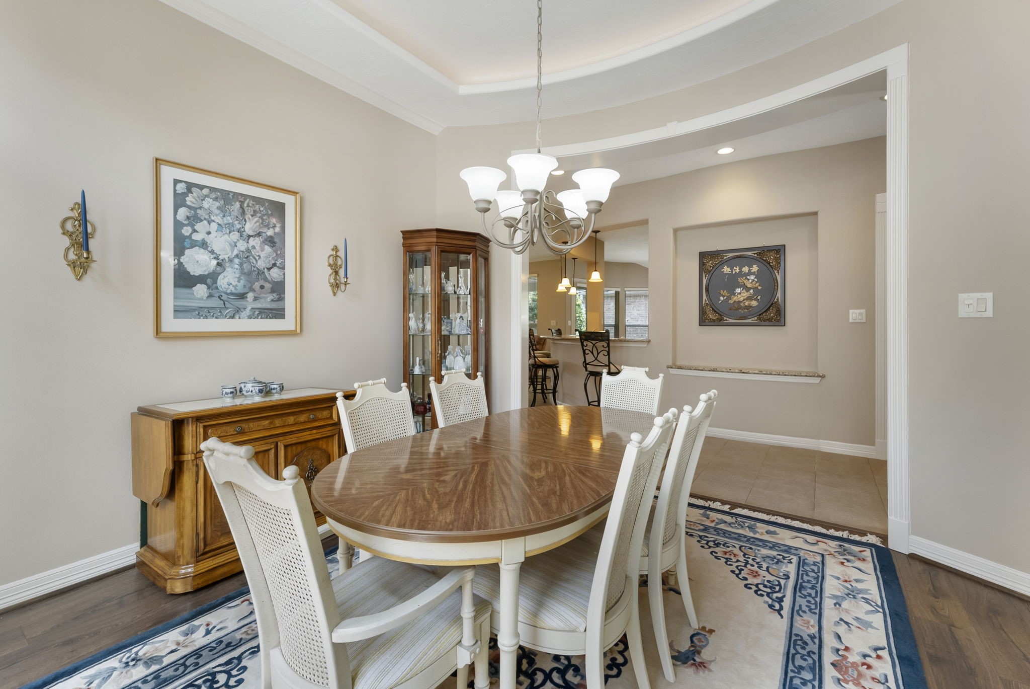25514 Long Iron Court Spring, TX 77389 - Photo 14 of 38 a view of a dining room with furniture and chandelier