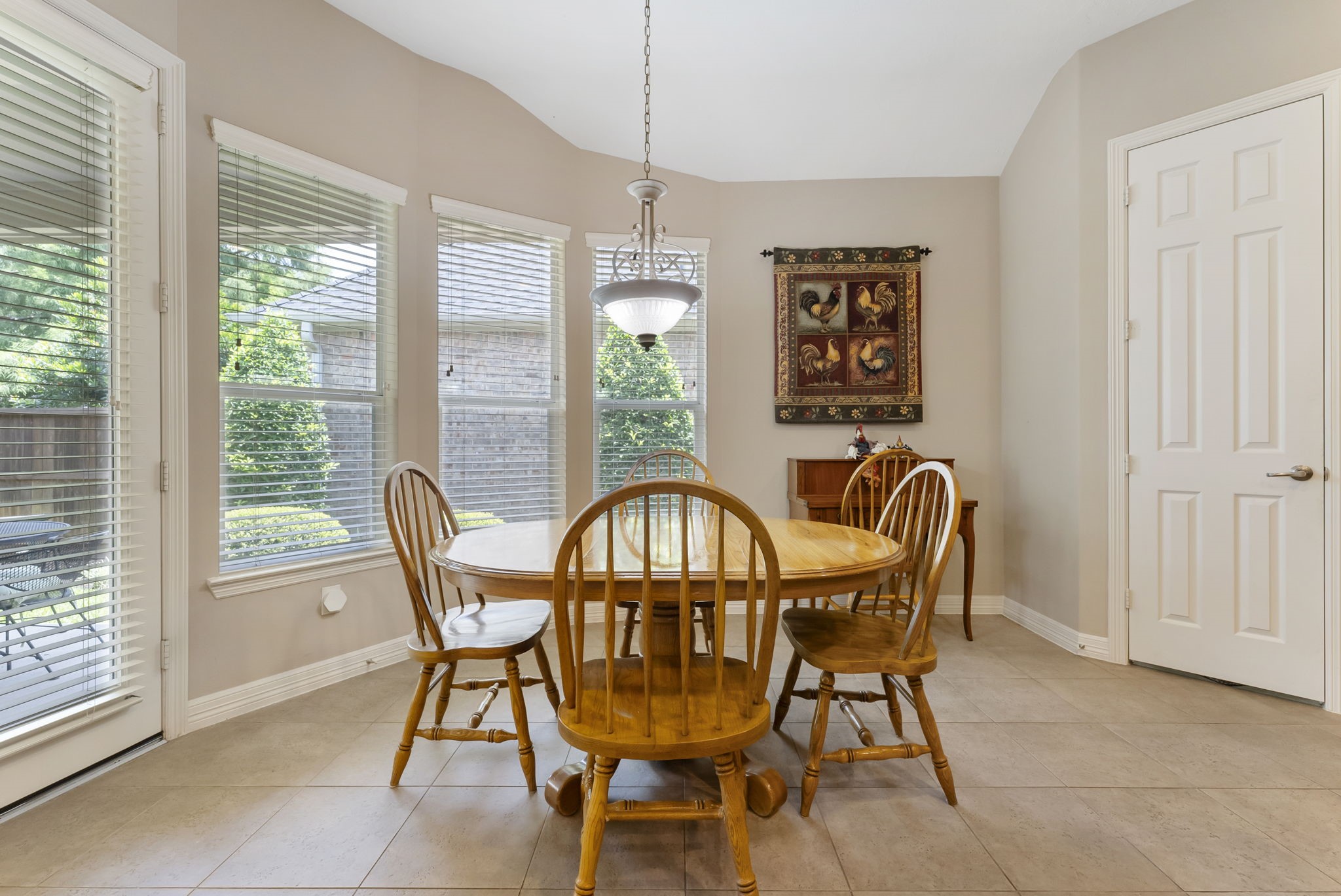 25514 Long Iron Court Spring, TX 77389 - Photo 15 of 38 a view of a dining room with furniture window and outside view