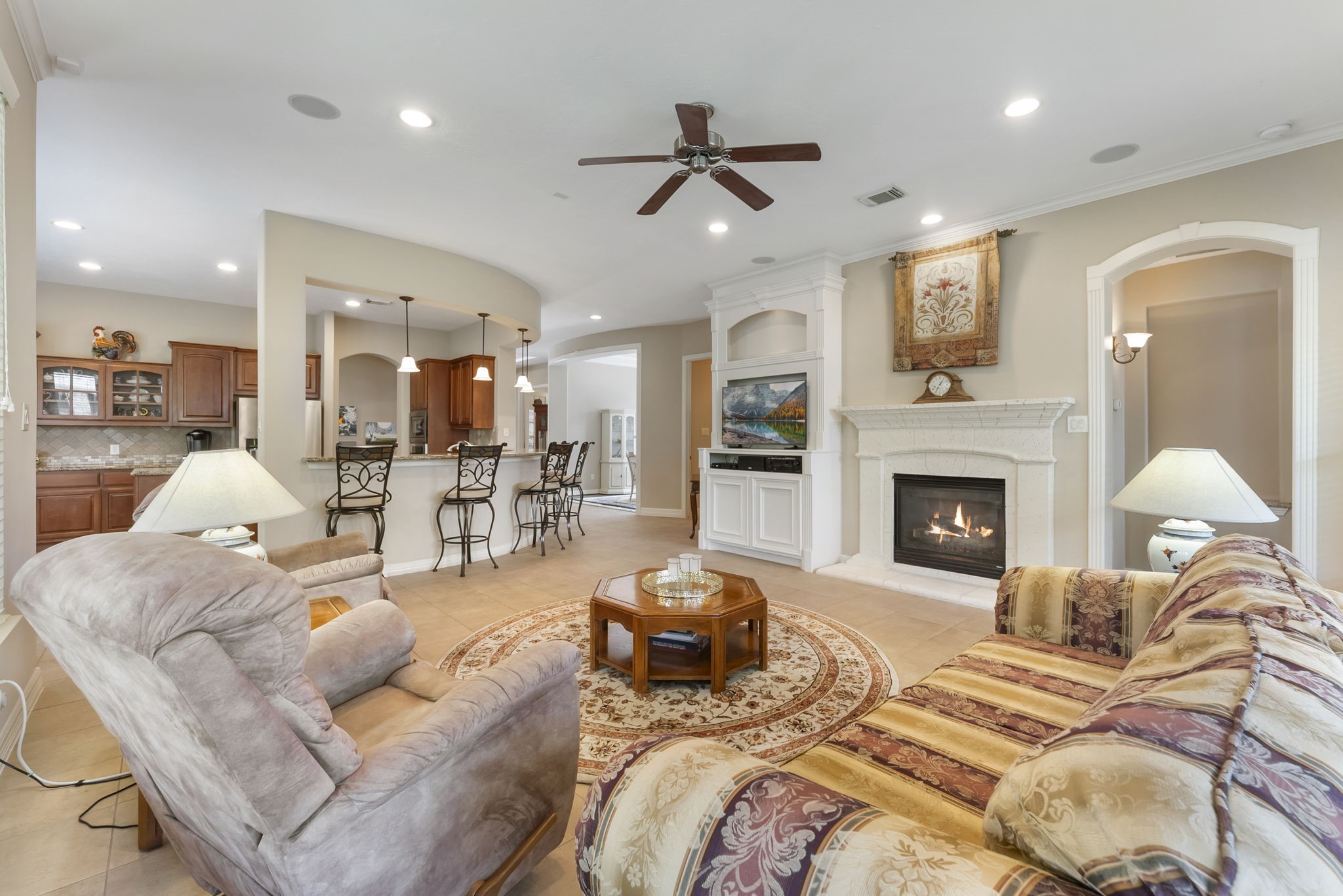 25514 Long Iron Court Spring, TX 77389 - Photo 18 of 38 At the heart of the family room is a cozy fireplace.
