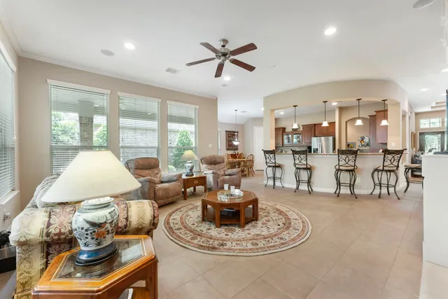 a building outdoor space with patio furniture and potted plants