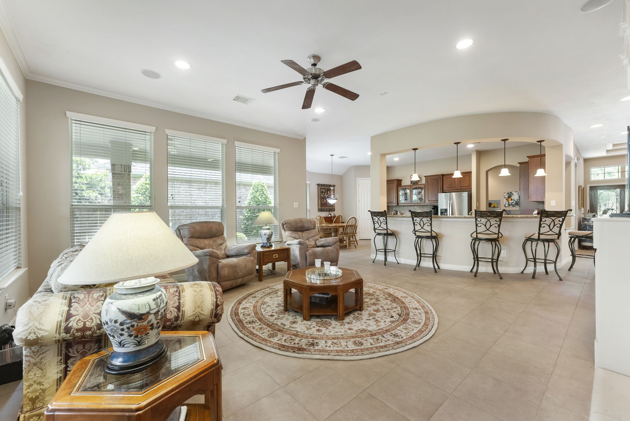 25514 Long Iron Court Spring, TX 77389 - Photo 19 of 38 Walls of windows let in abundant natural light.