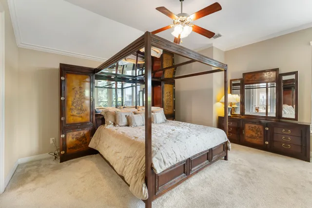 a view of a house with backyard porch and sitting area
