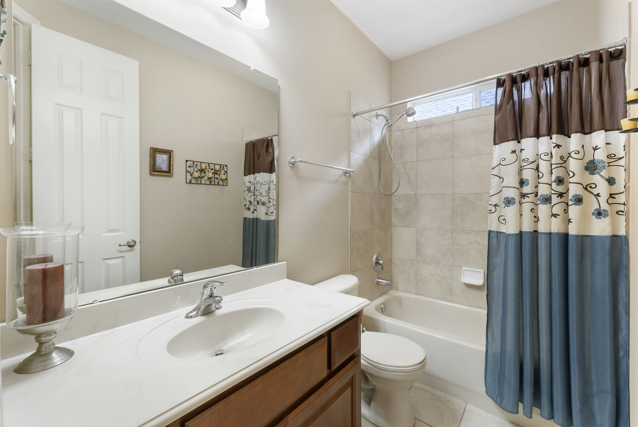 25514 Long Iron Court Spring, TX 77389 - Photo 25 of 38 a bathroom with a sink toilet and shower