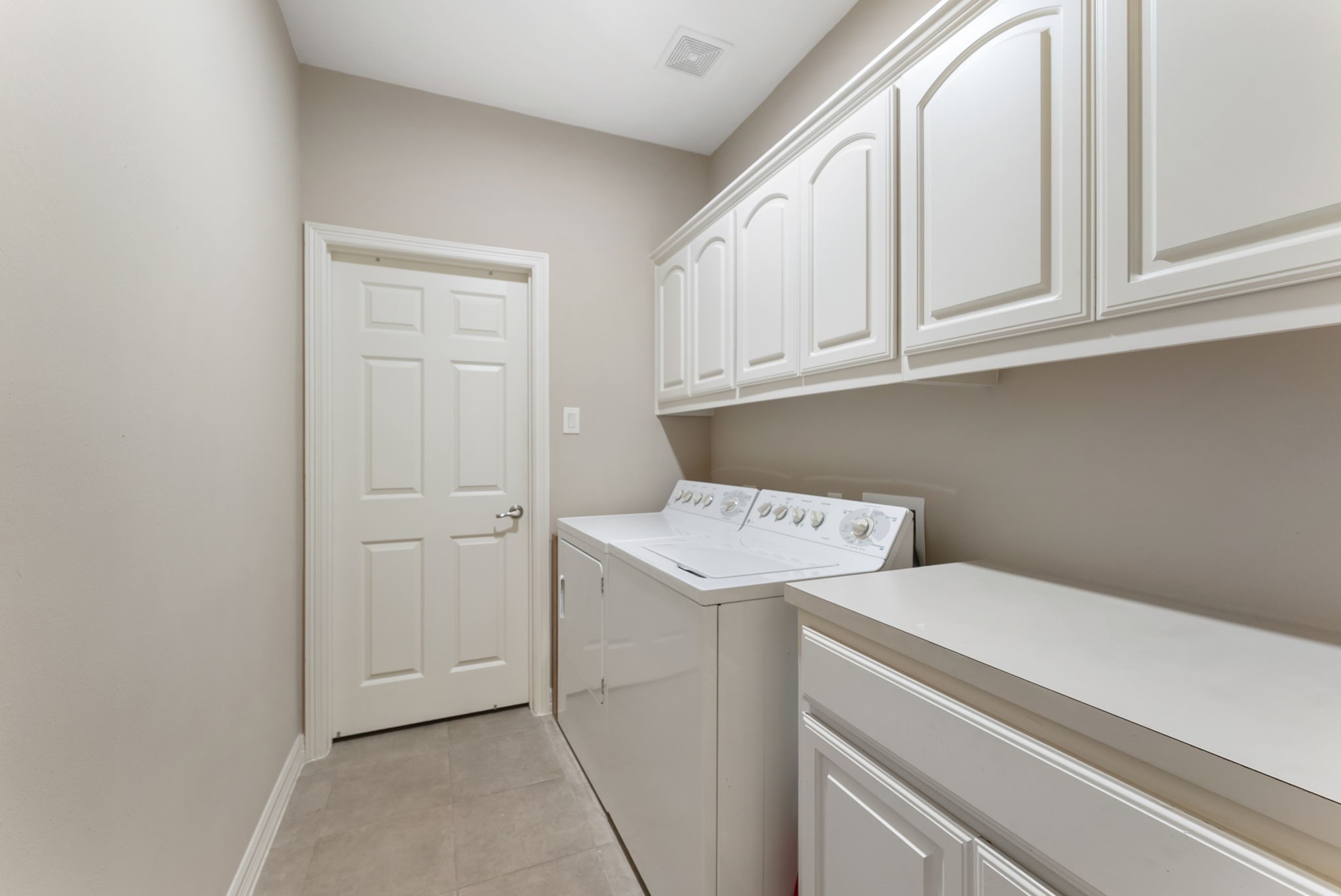 25514 Long Iron Court Spring, TX 77389 - Photo 28 of 38 a utility room with dryer and washer