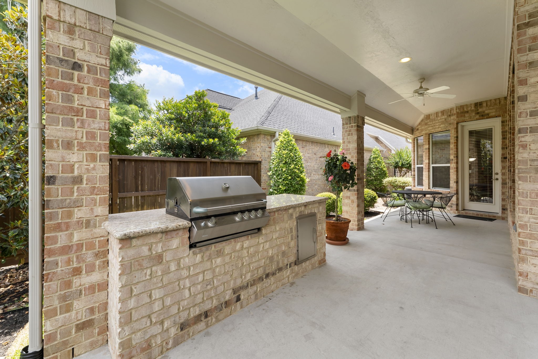 25514 Long Iron Court Spring, TX 77389 - Photo 29 of 38 a building outdoor space with patio furniture and potted plants