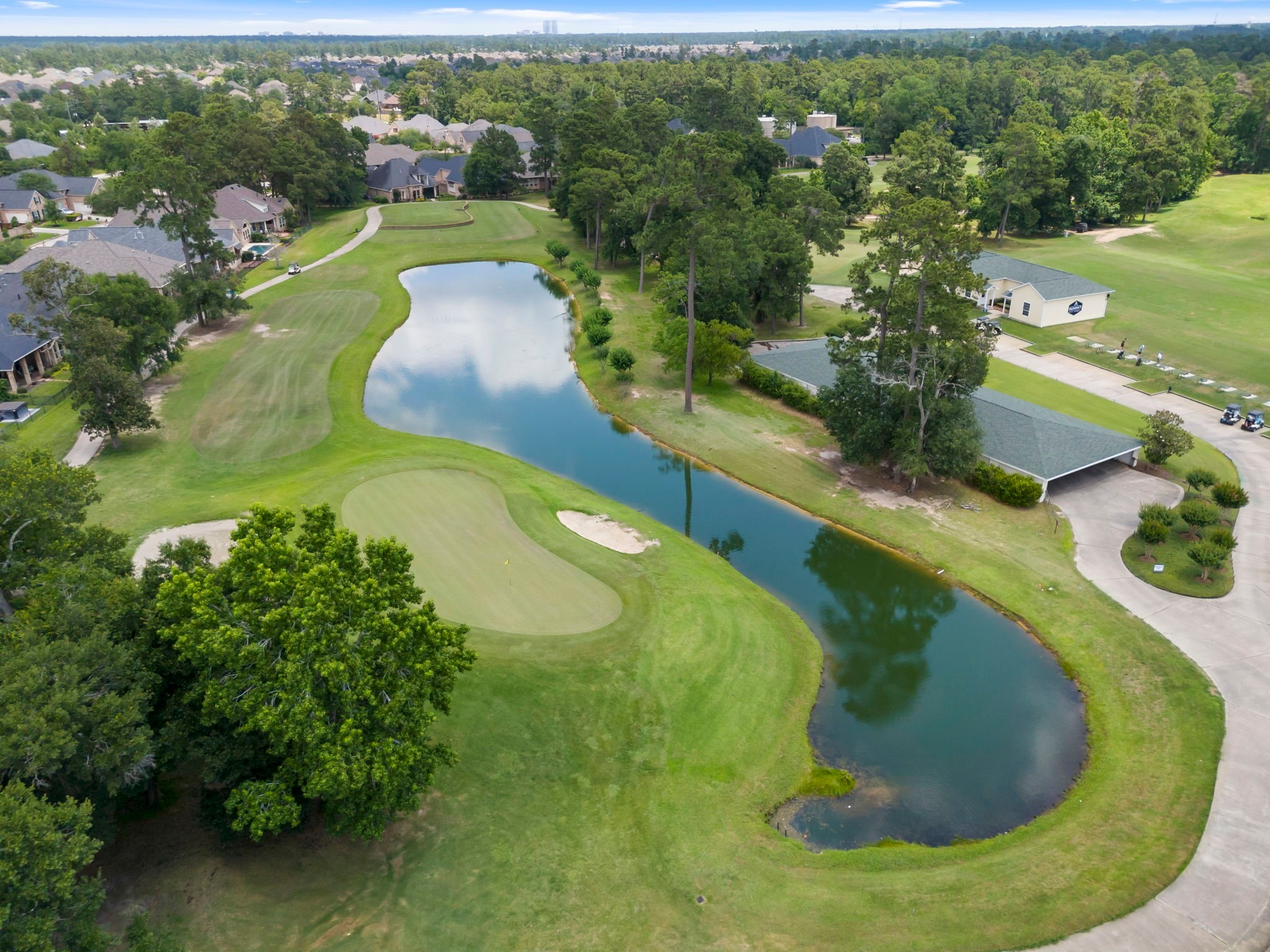 25514 Long Iron Court Spring, TX 77389 - Photo 6 of 38 a view of a swimming pool with a yard