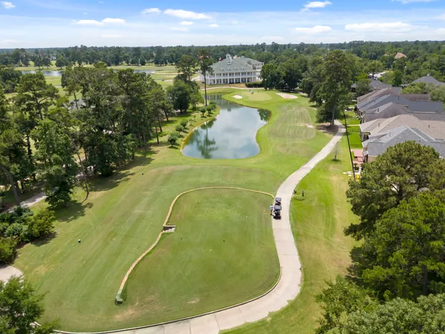 a room with lots of table and chairs