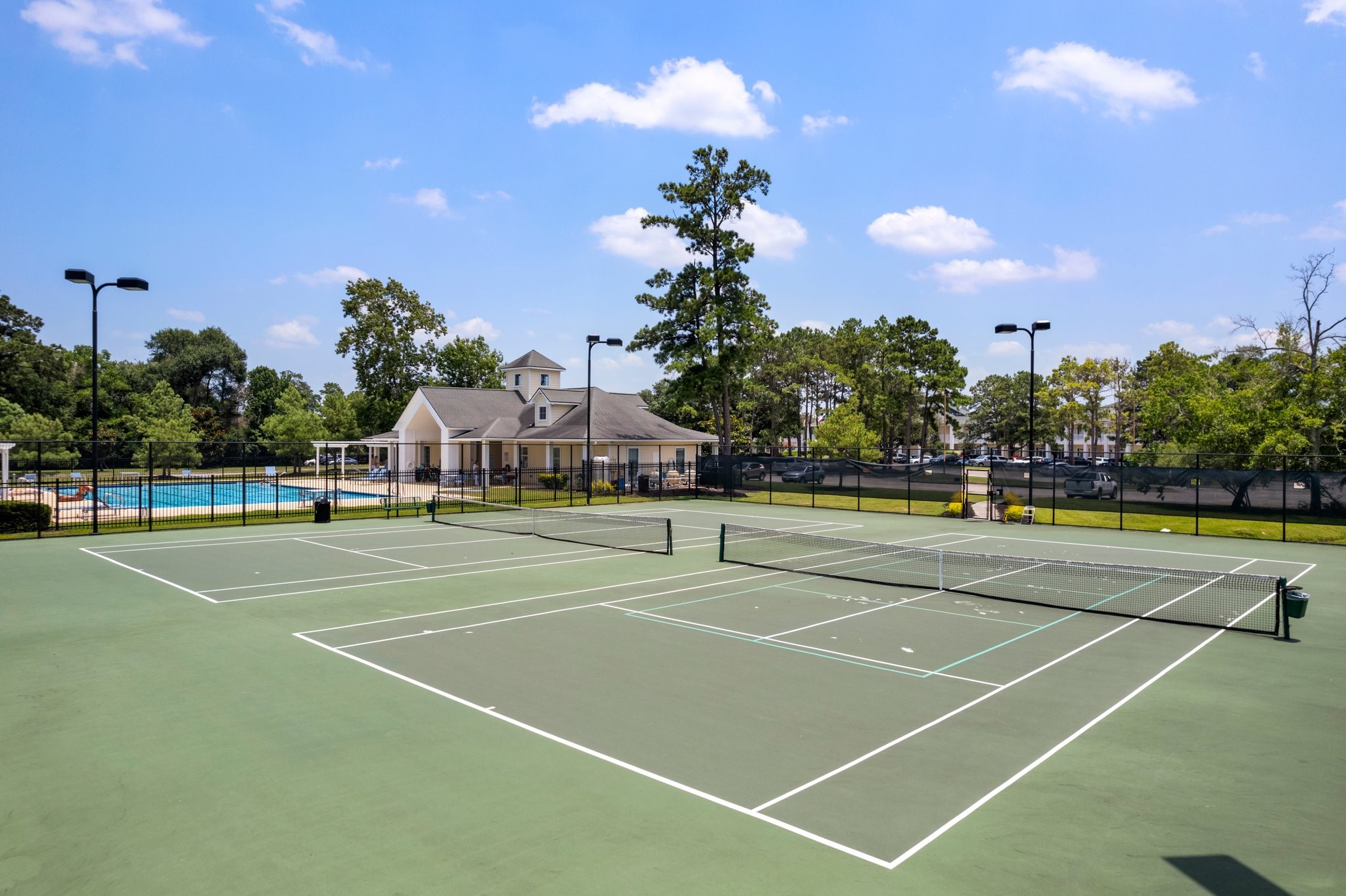 25514 Long Iron Court Spring, TX 77389 - Photo 8 of 38 a view of a tennis court