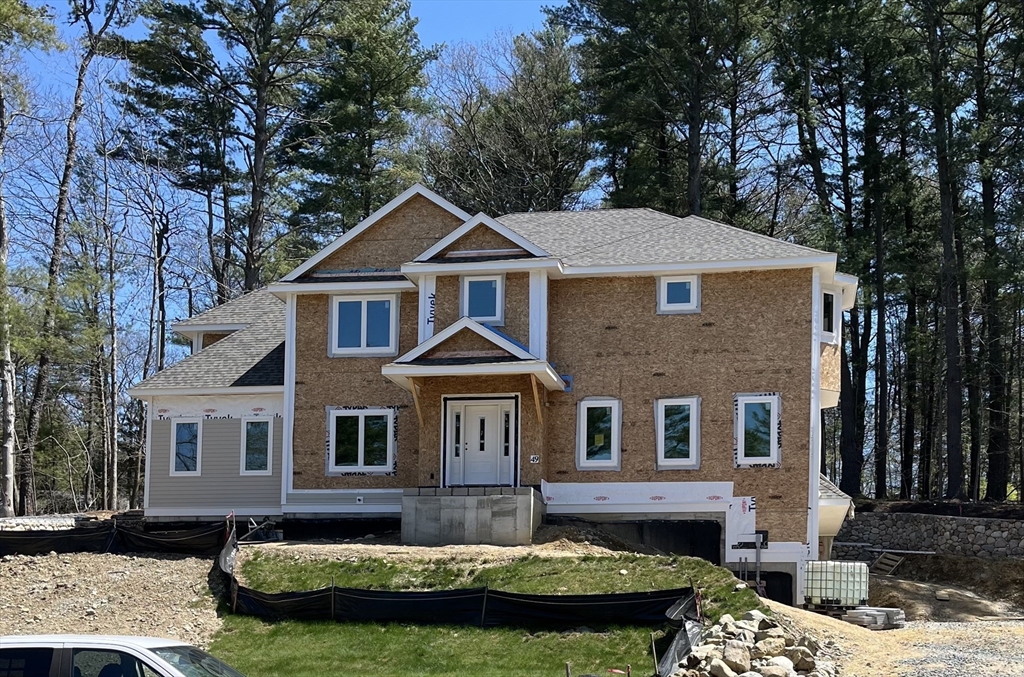 49 Country Club Way Ipswich, MA 01938 - Photo 1 of 4 a front view of a house with a yard