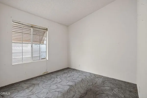 a view of a room with a window