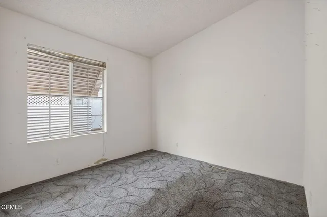 a view of a room with a window