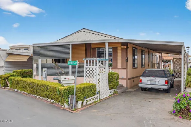 a house view with a garden space