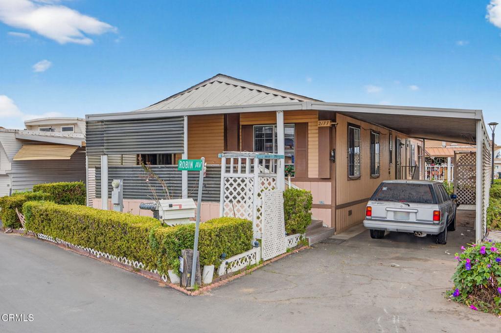 2177 Robin Avenue, Unit 2177A Oxnard, CA 93033 - Photo 2 of 28 a house view with a garden space