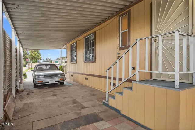 a car parked in front of a house