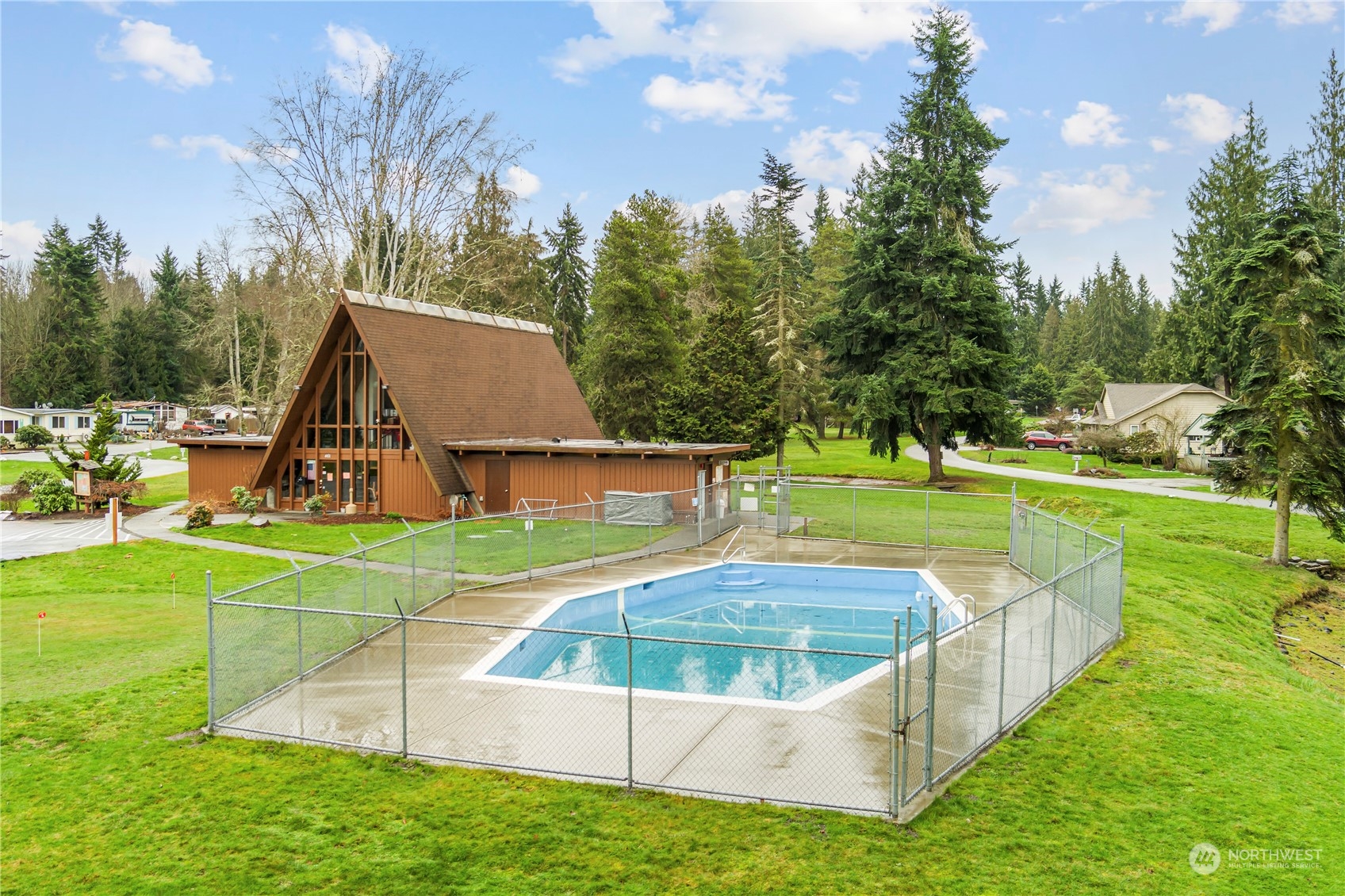 383 Dungeness Meadows Sequim, WA 98382 - Photo 26 of 30 a view of a house with swimming pool and yard