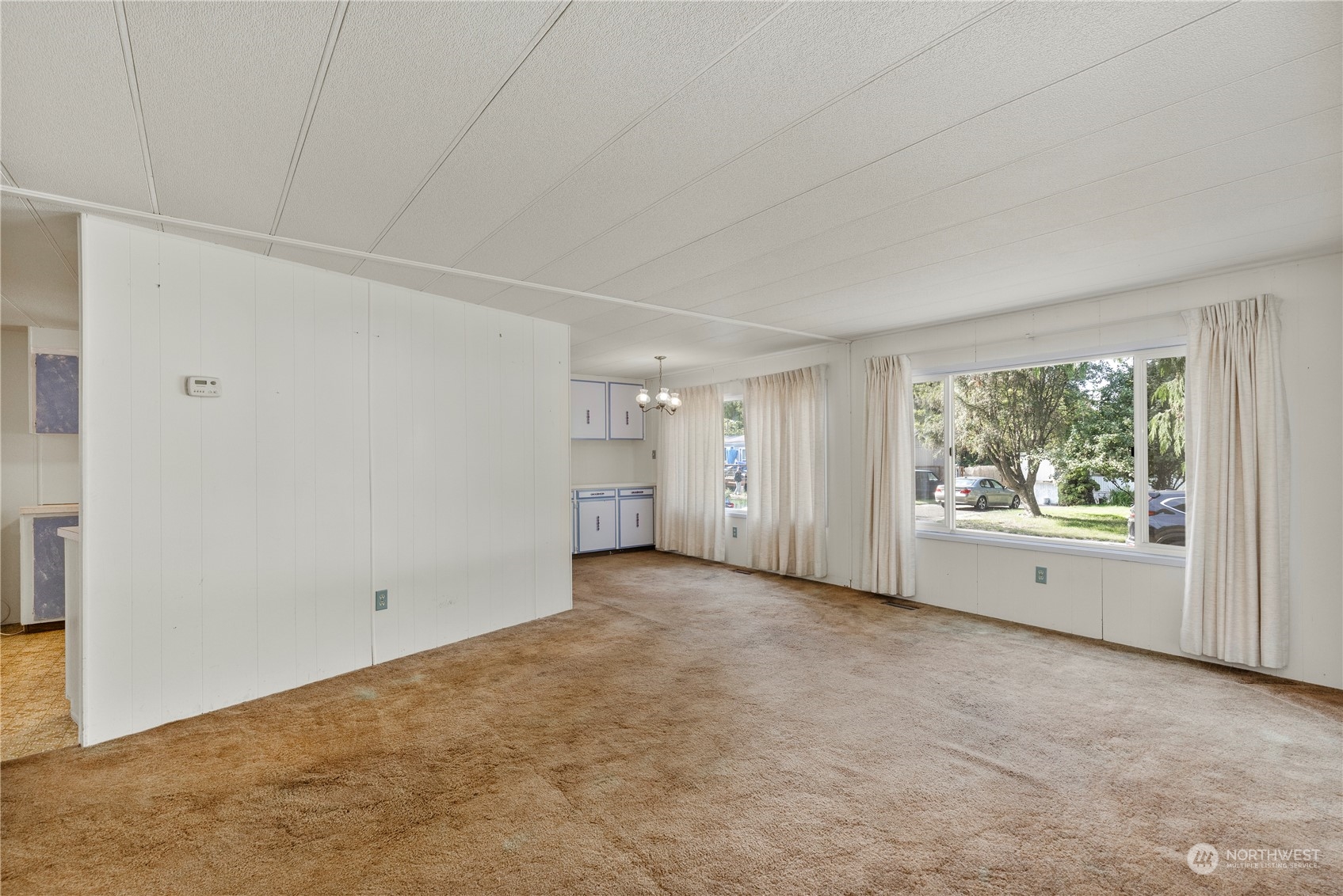 383 Dungeness Meadows Sequim, WA 98382 - Photo 3 of 30 a view of an empty room with a window