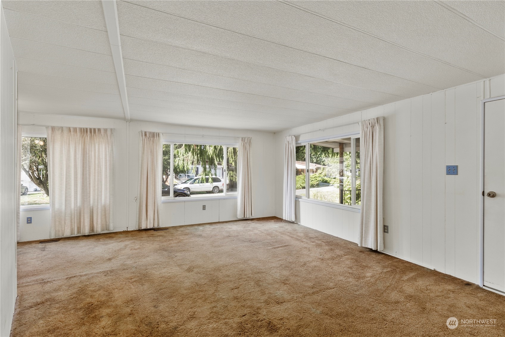383 Dungeness Meadows Sequim, WA 98382 - Photo 4 of 30 a view of an empty room with window and closet area