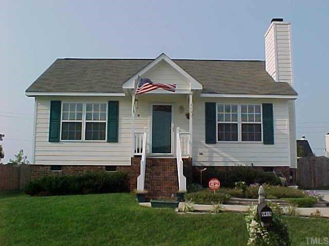 4409 Moss Spring Drive Raleigh, NC 27616 - Photo 1 of 1 a front view of a house with garden