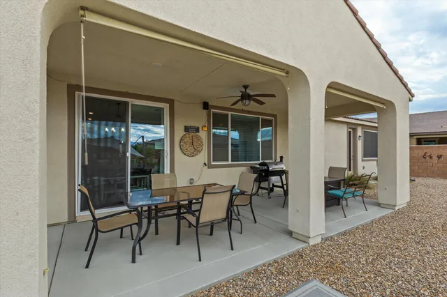 a outdoor space with lots of tables and chairs