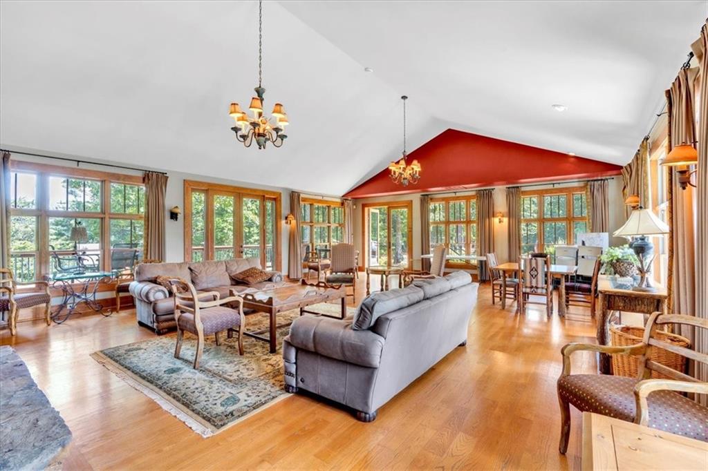 52 Waterside Drive Southeast Cartersville, GA 30121 - Photo 110 of 110 a living room with furniture large window and a table
