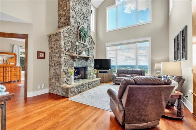 a bathroom with a double vanity sink mirror and bathtub